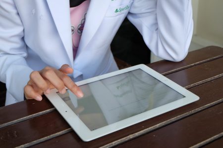 Doctor holding tablet , E-Health concept , business concept